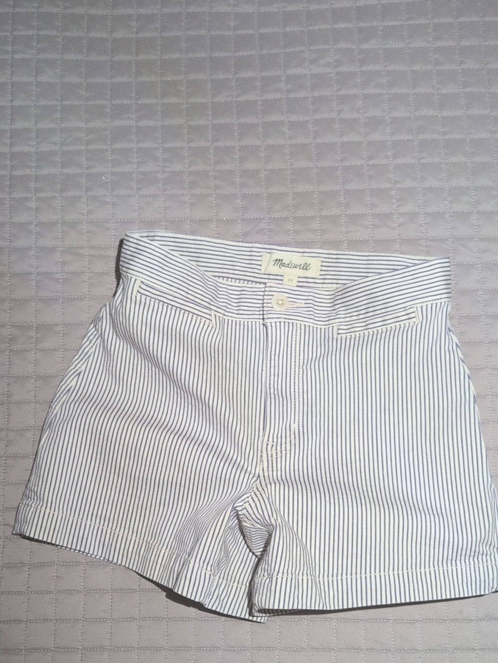 Madewell pinstriped shorts featuring a blue and white Stripes. Size 25.